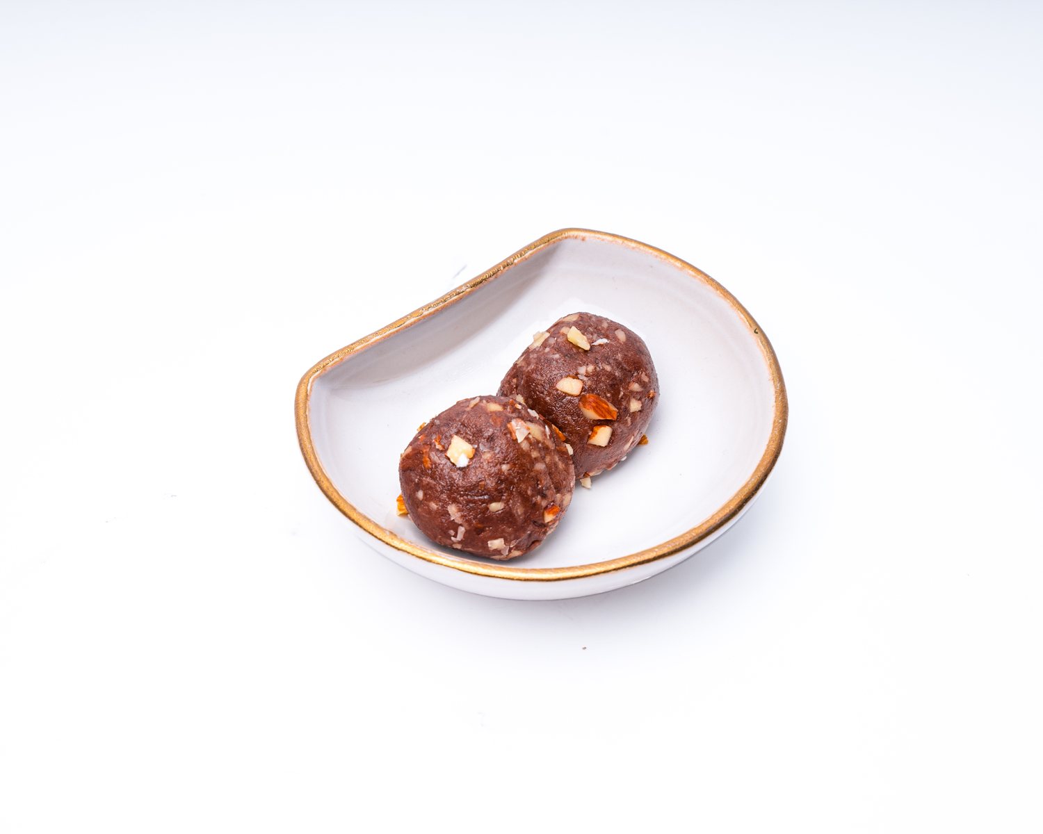 Cacao Almond Energy Bites — Dates, cacao, almonds — two-piece protein bites.