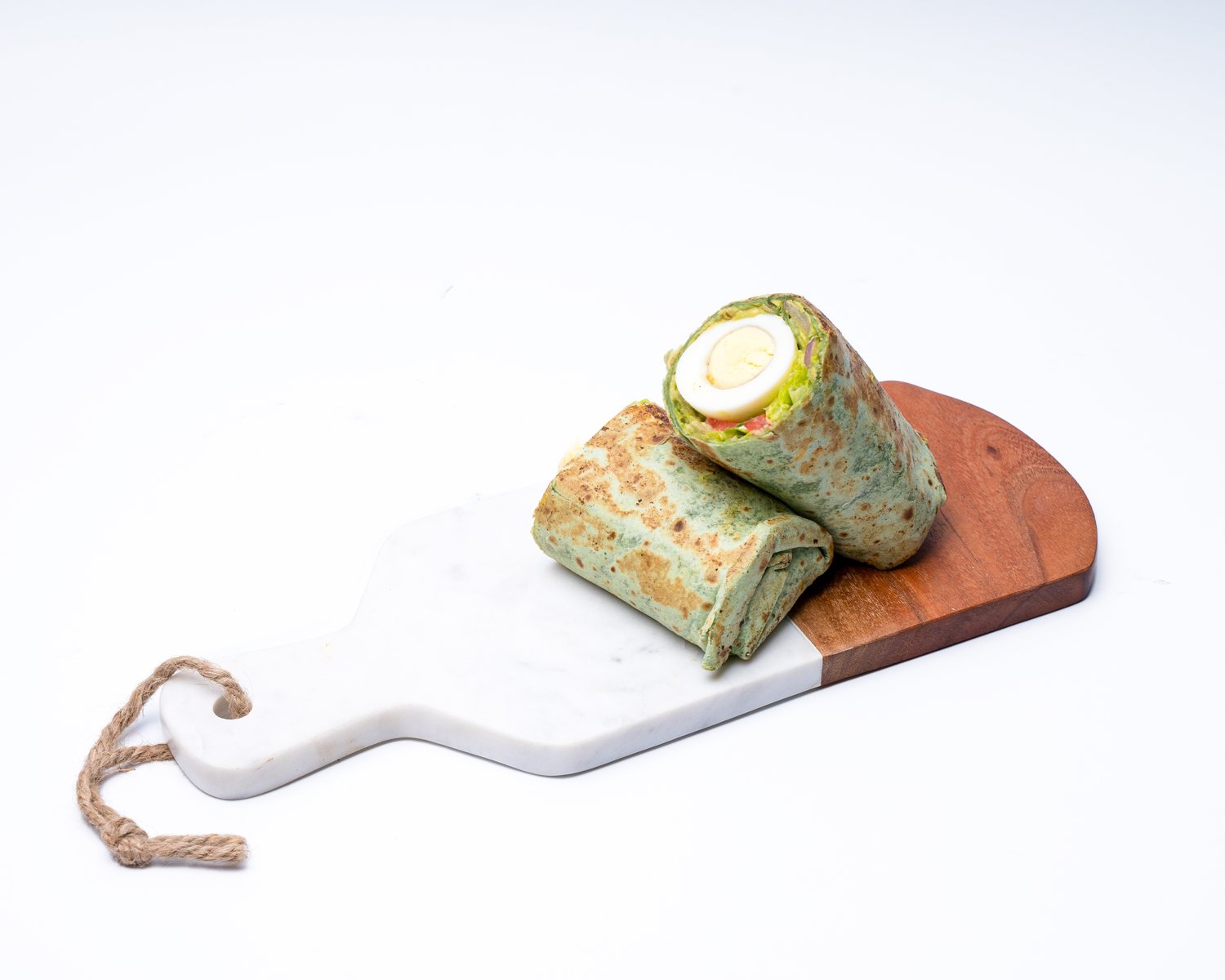 Spinach Egg Breakfast Roll — Spinach tortilla, egg, avocado, turkey.