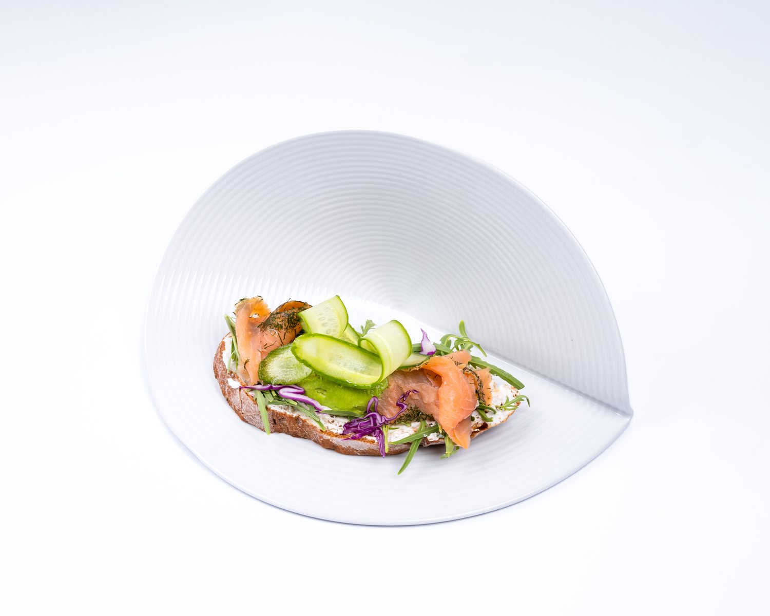 Smoked Salmon Sourdough — Sourdough, avocado, smoked salmon, pickled cucumber.